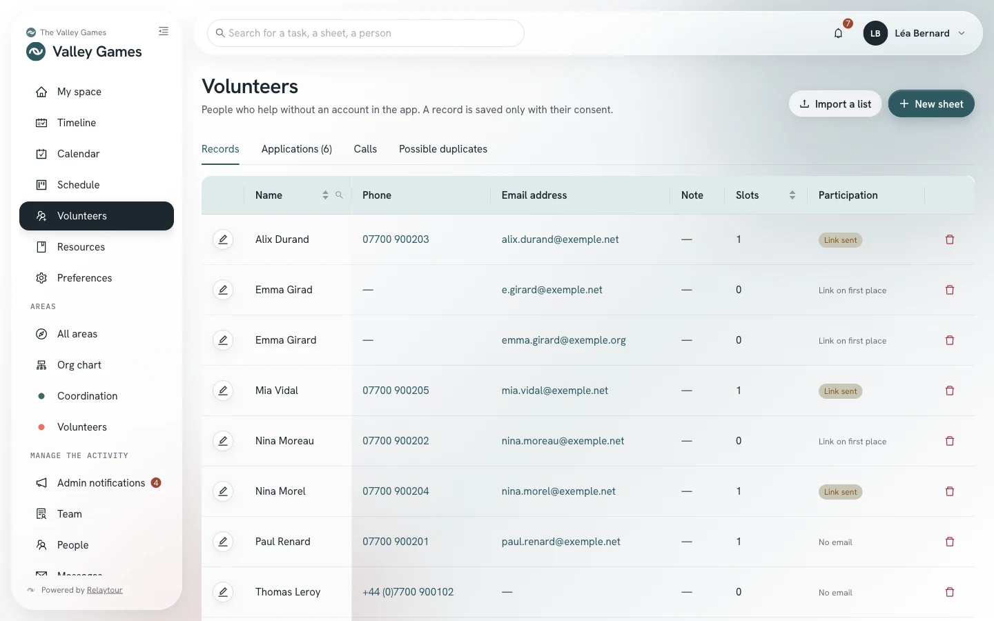 Volunteers screen: the table of volunteer records with their name, phone number, email address, and number of slots.